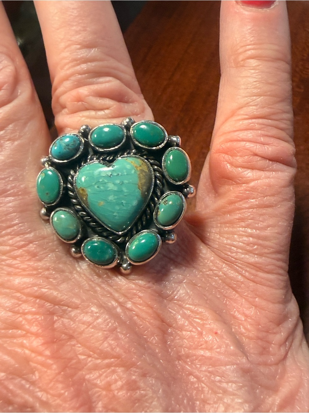 Beautiful Kingman Turquoise Heart  surrounded by a cluster of Kingman Turquoise